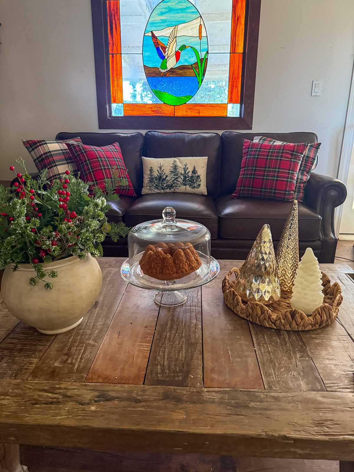 Lifestyle expert, journalist and interior design blogger Candie Anderson of candieanderson.com shares the best winter throw pillows that are also perfect for the holiday season on her beautiful new Canora Grey genuine leather sofa.