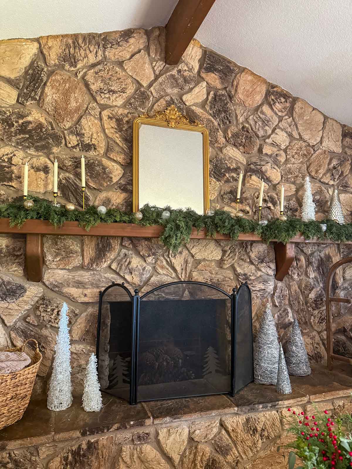 Entertaining expert, journalist and lifestyle blogger Candie Anderson of candieanderson.com shares her fireplace mantel decorated with charming, classic Christmas decor.