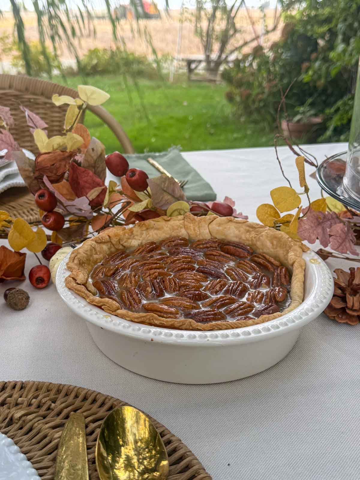 Entertaining expert, journalist and lifestyle blogger Candie Anderson of candieanderson.com shares the beautiful chocolate pecan pie she made in a stoneware pie dish. It looks fantastic on her Thanksgiving tablescape.